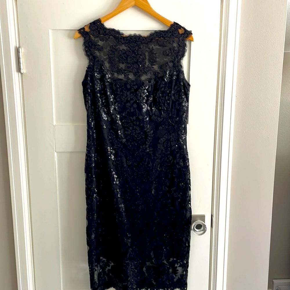 Beautiful sequin embellished black cocktail dress with exquisite lace edging